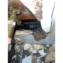 The plaster board behind the laundry tub was destroyed as result of the water leak in Monash Canberra