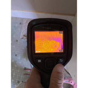 Thermal camera used to fin a hot spot from a water leak in Wanniassa Canberra - Cause of leak was a reaction to cement