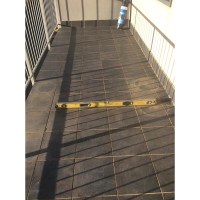 This leaking balcony caused water damage to the garage ceiling below in Ngunnawal Canberra